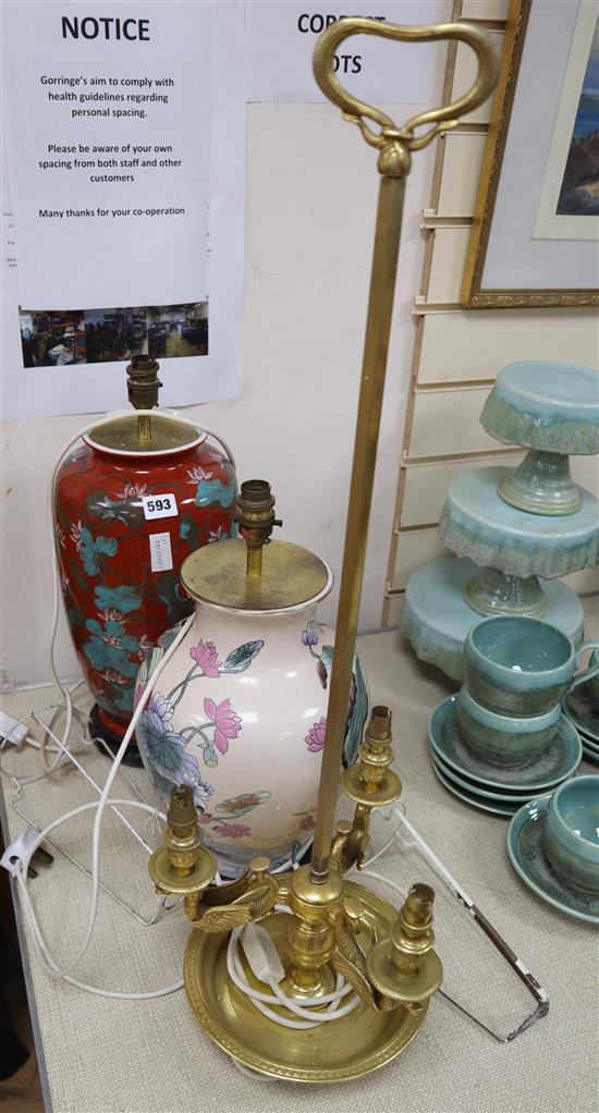 Two Chinese style porcelain table lamps and a gilt metal lamp, tallest 75cm